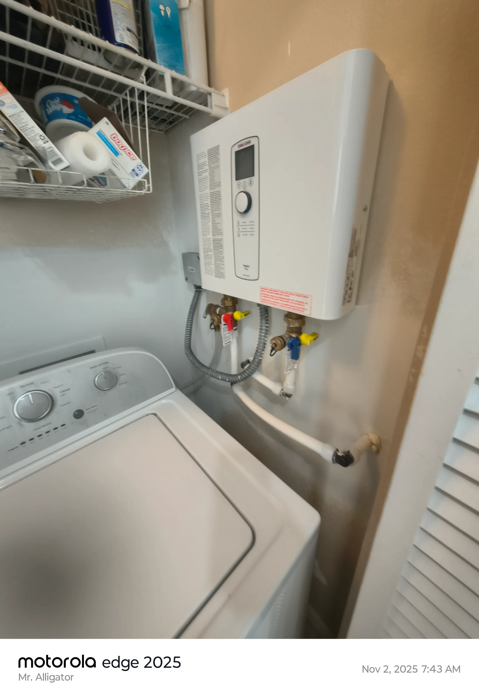 Tankless water heater with pump