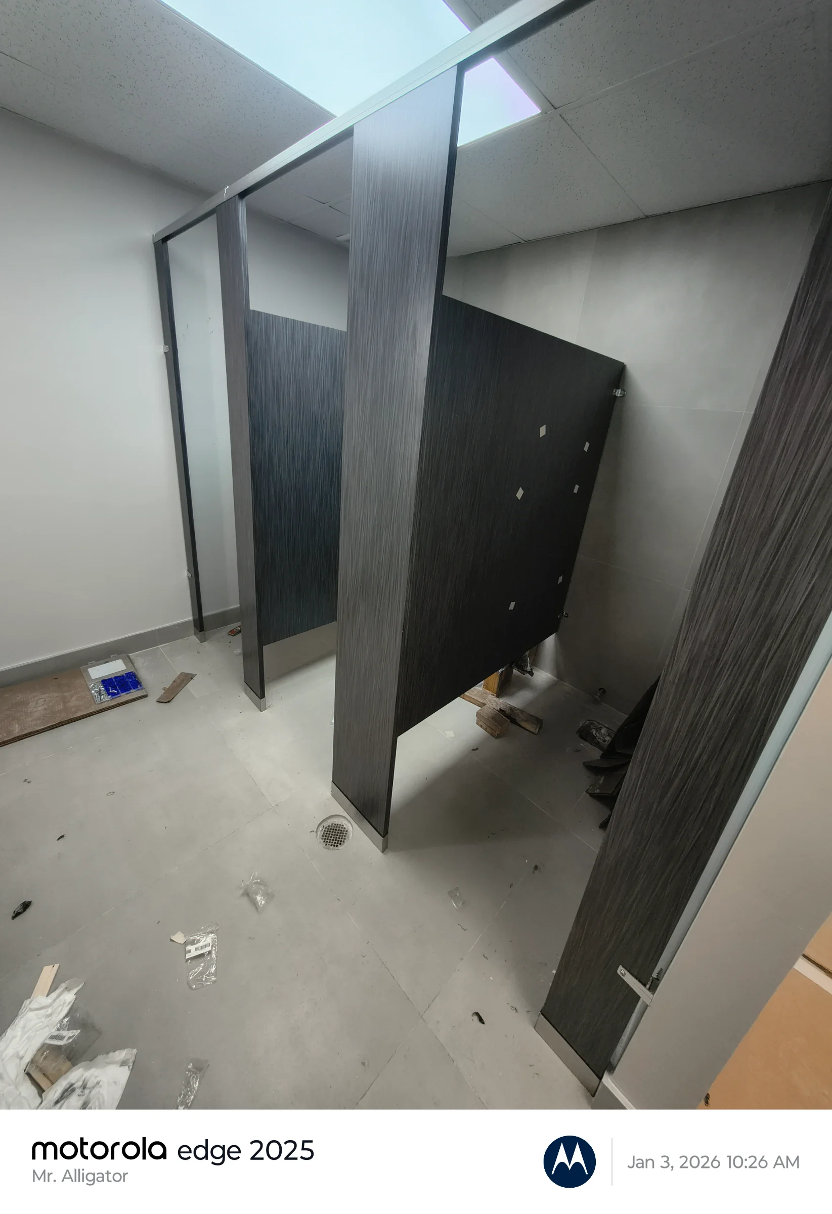 Restroom partitions and tile flooring